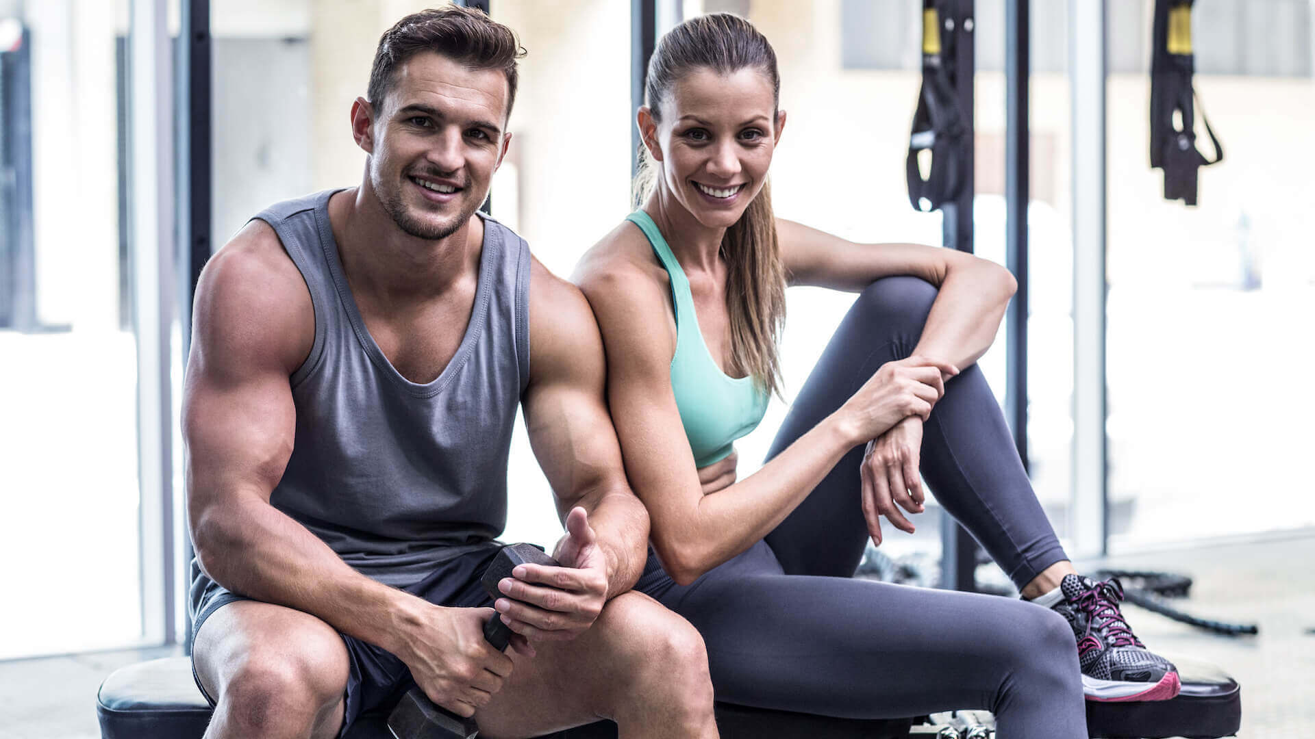 Couple smiling at gym - Club Maui Health Club — The Club Maui